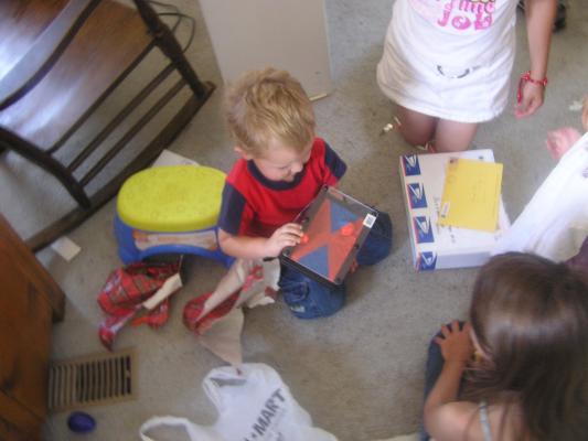 Noah gets a toy for his third birthday