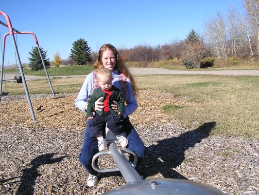 Katie and Noah on a teter totter.