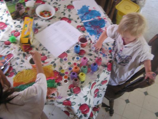 Sarah and Andrea are painting