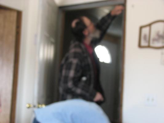 David and Robert fix the door.