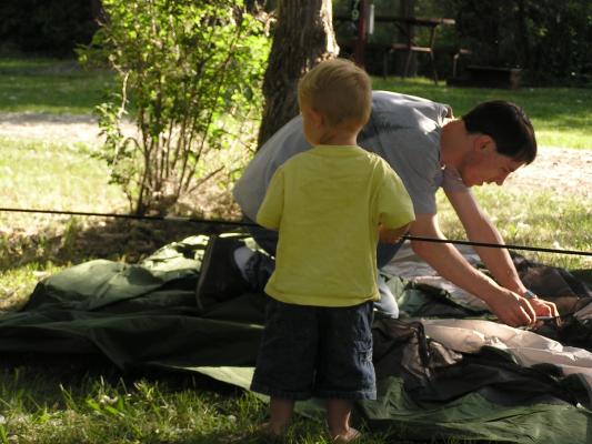 David and Noah put up the tent.