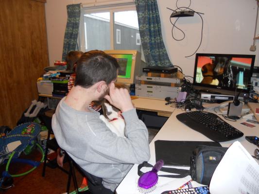 DAvid in his crazy messy office. 