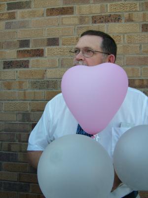 John with baloons