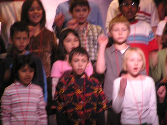 Malia's class sings in the Christmas program.