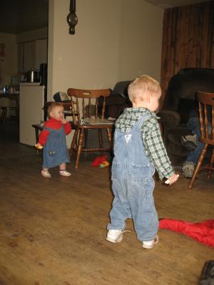 Sarah and Noah walk around great grandpa's house.