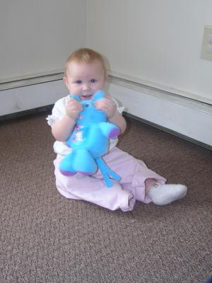 Sarah plays with her new elephant.