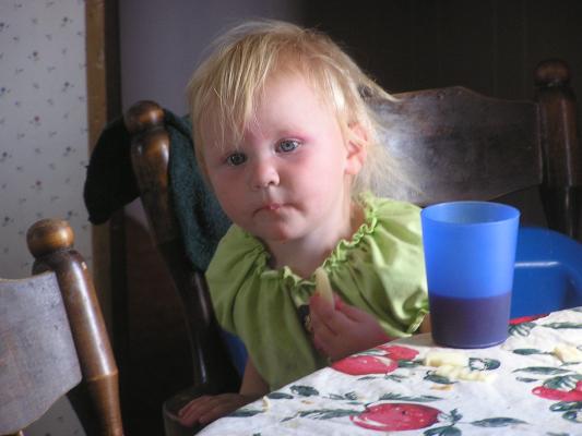 Sarah is having a snack and some juice