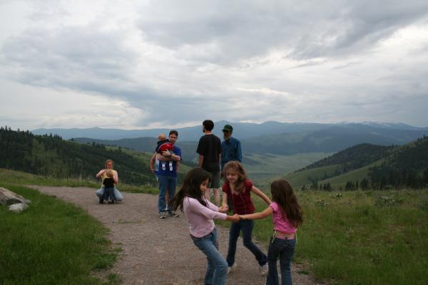 The girls play on the trail.