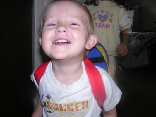 Noah is very happy. Andrea and Noah are playing school
