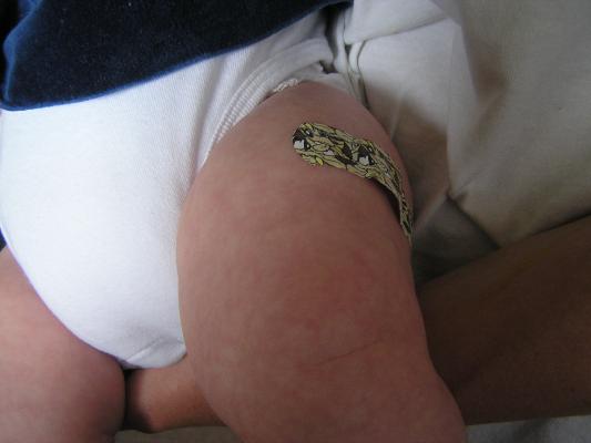 She has very fat little baby thighs.