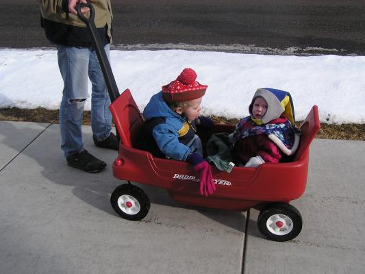 Noah and Sarah ride in the wagon.