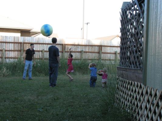 Matthew, Jim, Malia, Noah and Sarah play ball.