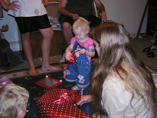 Sarah opens her Dora ball