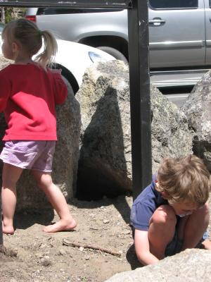 Sarah and Noah in dirt.