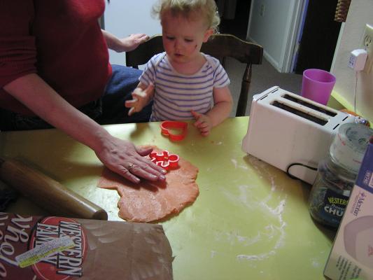 Katie and Noah make Valentines Day sugar cookies.