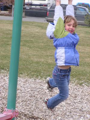 Mickala plays at the park before the Easter Egg hunt.
