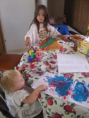 Sarah and Andrea are painting