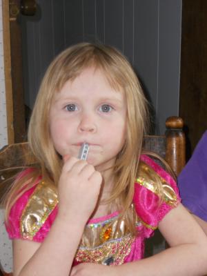 Sarah with a Lego