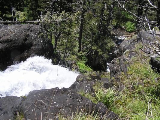 Looking down the edge of the falls.
See the bridge far below.