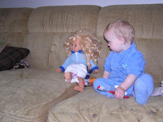 Sarah and another doll who needs her hair brushed.