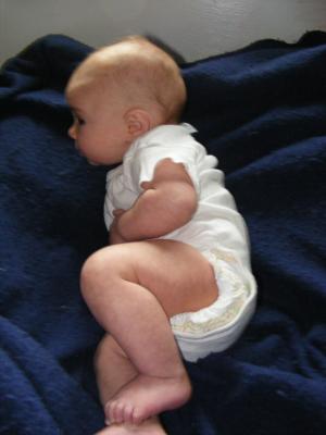 Joshua in a blue blanket.