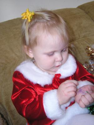 Sarah in her red and white Christmas dress.
