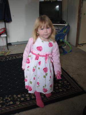 Grandma Eder got Sarah a pretty dress.