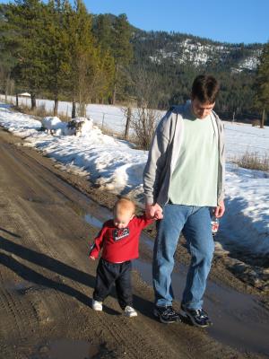 Steven and Robert walk down the road.