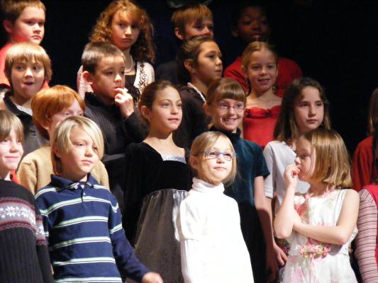 Andrea in school program.