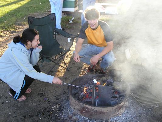 Christian Student Fellowship campout.
Roasting Marshmellows.