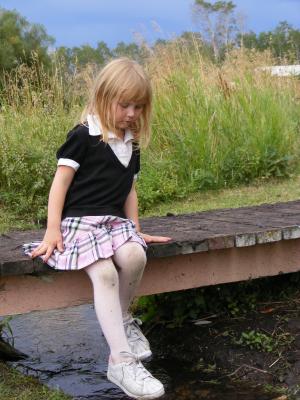 Sarah on a bridge.
