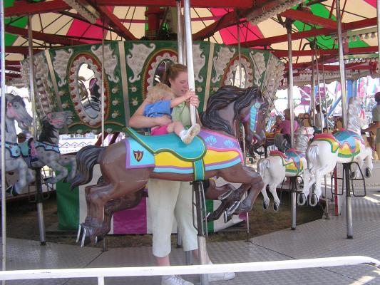 Katie and Sarah on the carousel