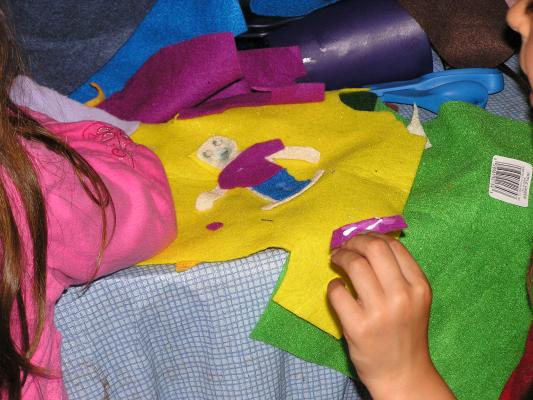 Andrea and Malia cut things out with felt.