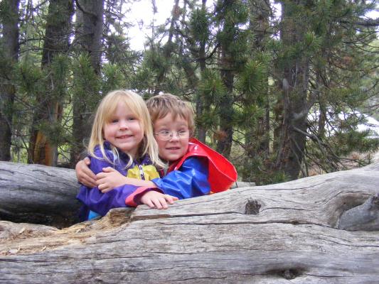 Sarah and Noah on a log.