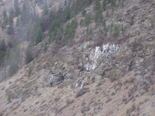 Icicles hanging from the hill.