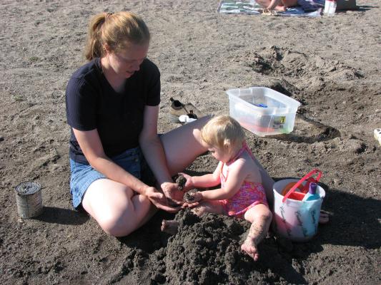 Katie and Sarah play in the sand