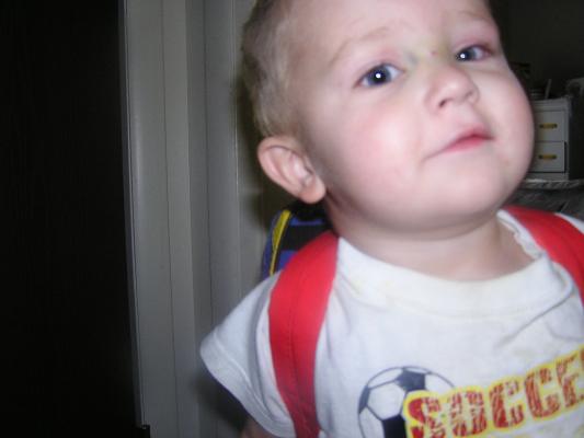 Noah wears a backpack.
