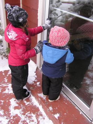Noah and Sarah play in the snow.