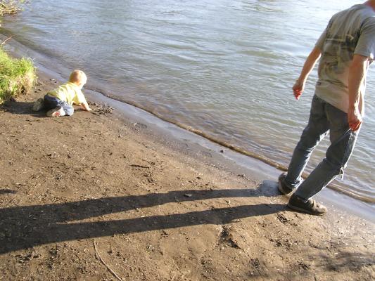 Noah and David on the bank of the Yellowstone River.