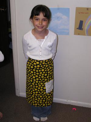 Malia in her new apron.