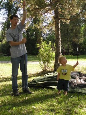 David and Noah put up the tent.