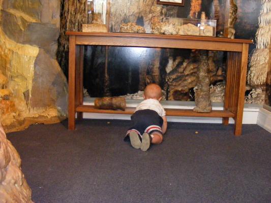 Looking at cave rocks.