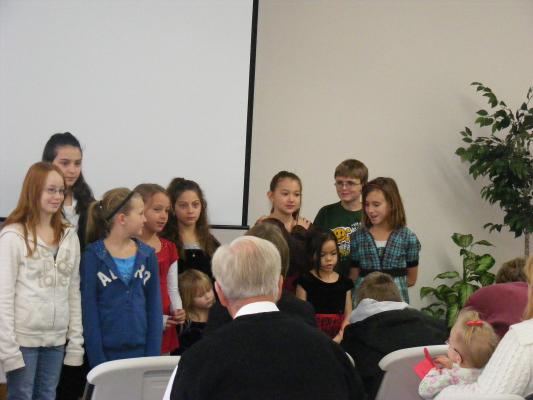 Children singing at church