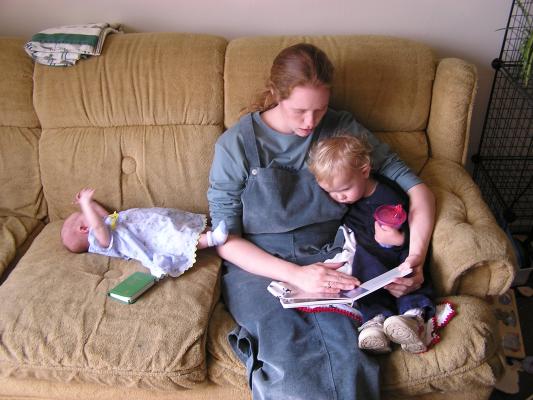 Katie reads the Easter book to Noah and Sarah.