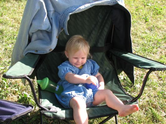 Sarah sits in a lawn chair