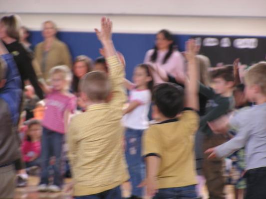 Blury Aundrea singing with her class.