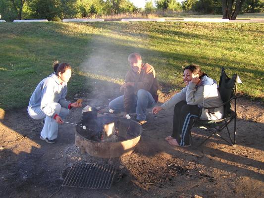Christian Student Fellowship campout.
Toasting Marshmellows.