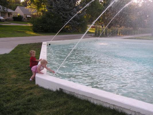 Noah and Sarah play with the Alliance Fountain