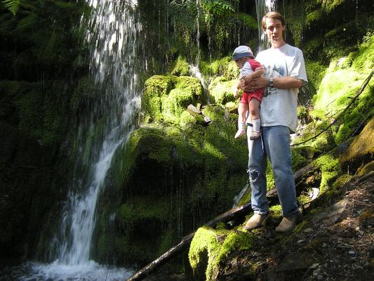 Sarah and David by a waterfall.