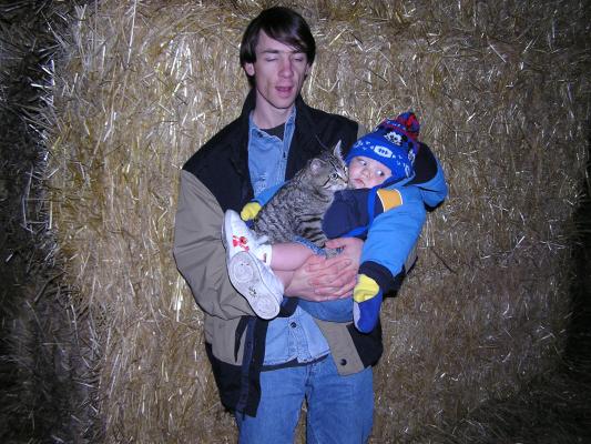 David and Noah take the kitty through the maze.